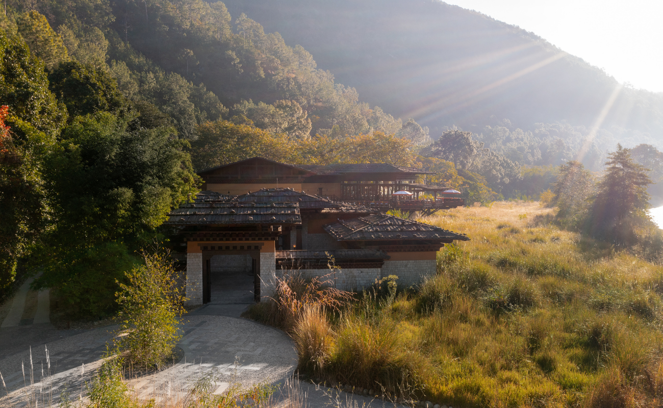 Forest and mountain landscape surrounding Pemako Punakha in Bhutan